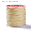A spool of 0.8mm red nylon cord for jewelry making and crafting.