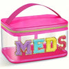 Pinke tragbare Aufbewahrungstasche mit klarem Fenster, das das Wort MEDS in farbenfrohen Glitzerbuchstaben zeigt.