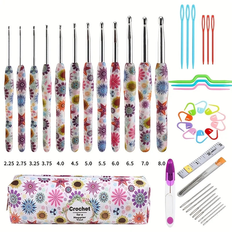 A set of ergonomic crochet hooks with sunflower designs in various sizes from 2.25 to 10.0mm, packaged in a floral-patterned 