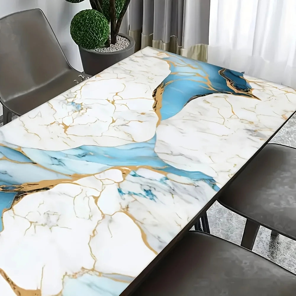 Marble peel-and-stick wallpaper featuring blue and gold veining on a dining table.