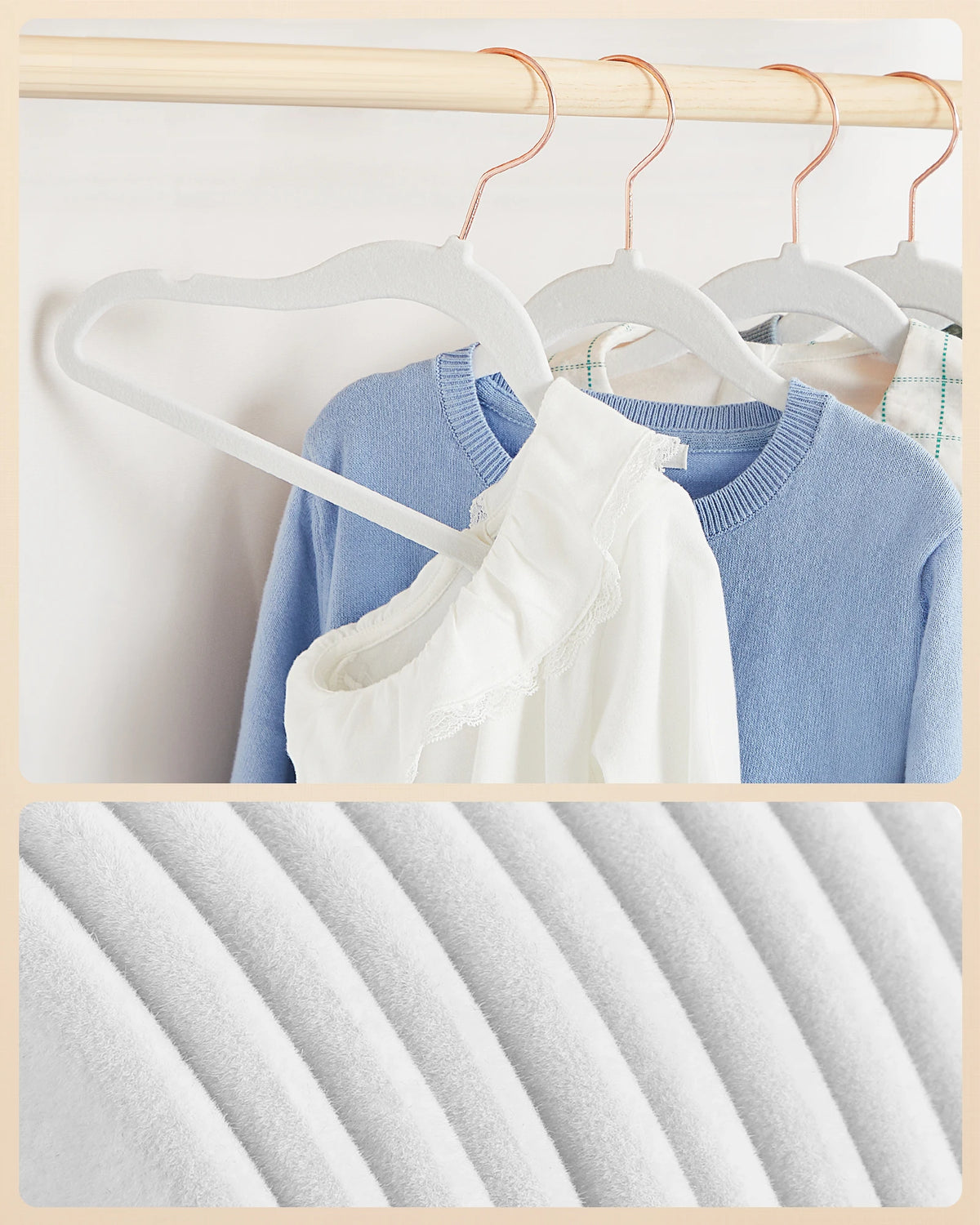 A white velvet hanger with a curved hook is shown hanging on a wooden rod, next to a blue sweater.