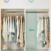 A display of light colored children's clothing hanging on velvet hangers inside a white closet with a sad and happy face icon