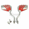 A set of two universal skull hand motorcycle side mirrors with red grips and chrome mounting hardware.