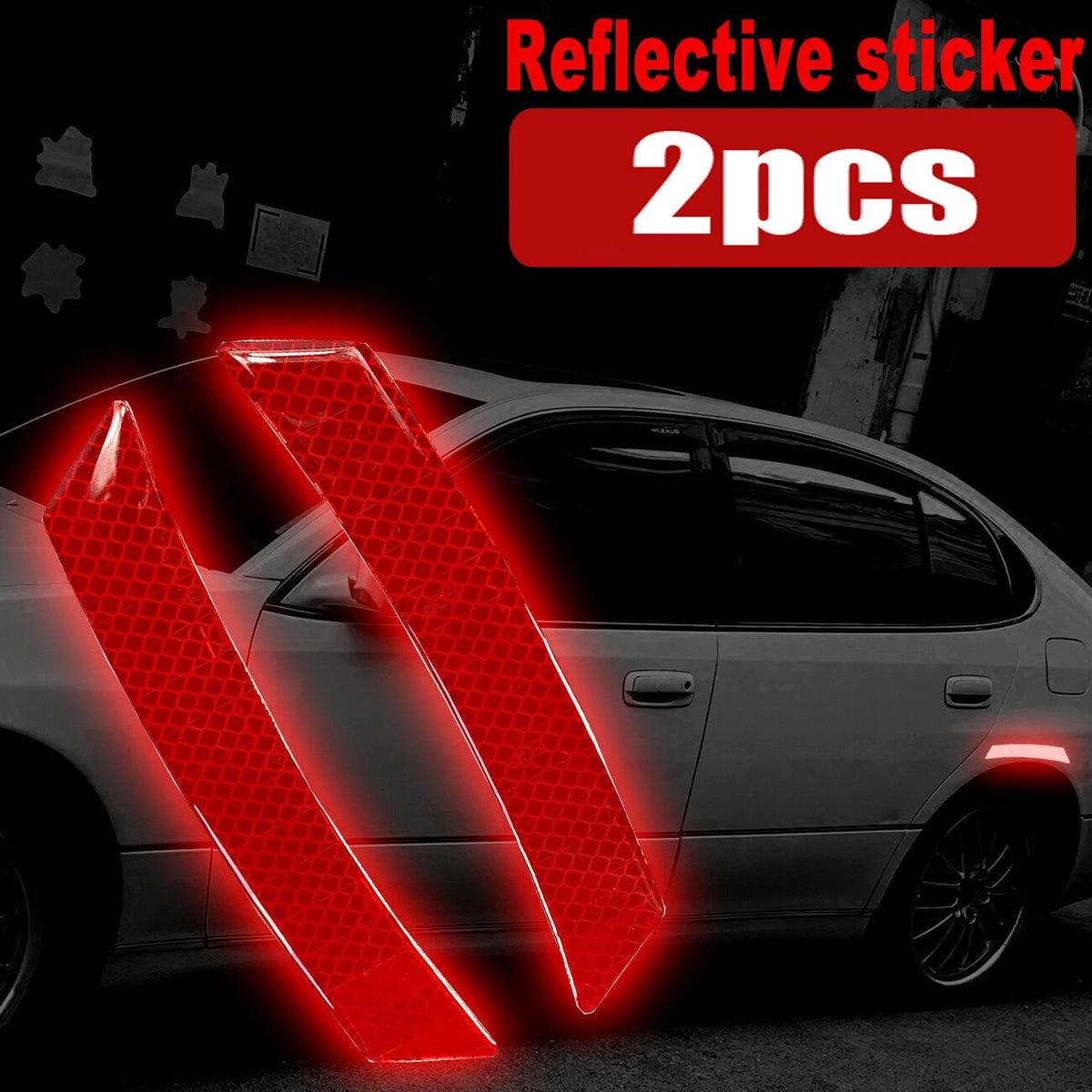 Two red reflective sticker strips are shown on a silver car body in a dark setting.