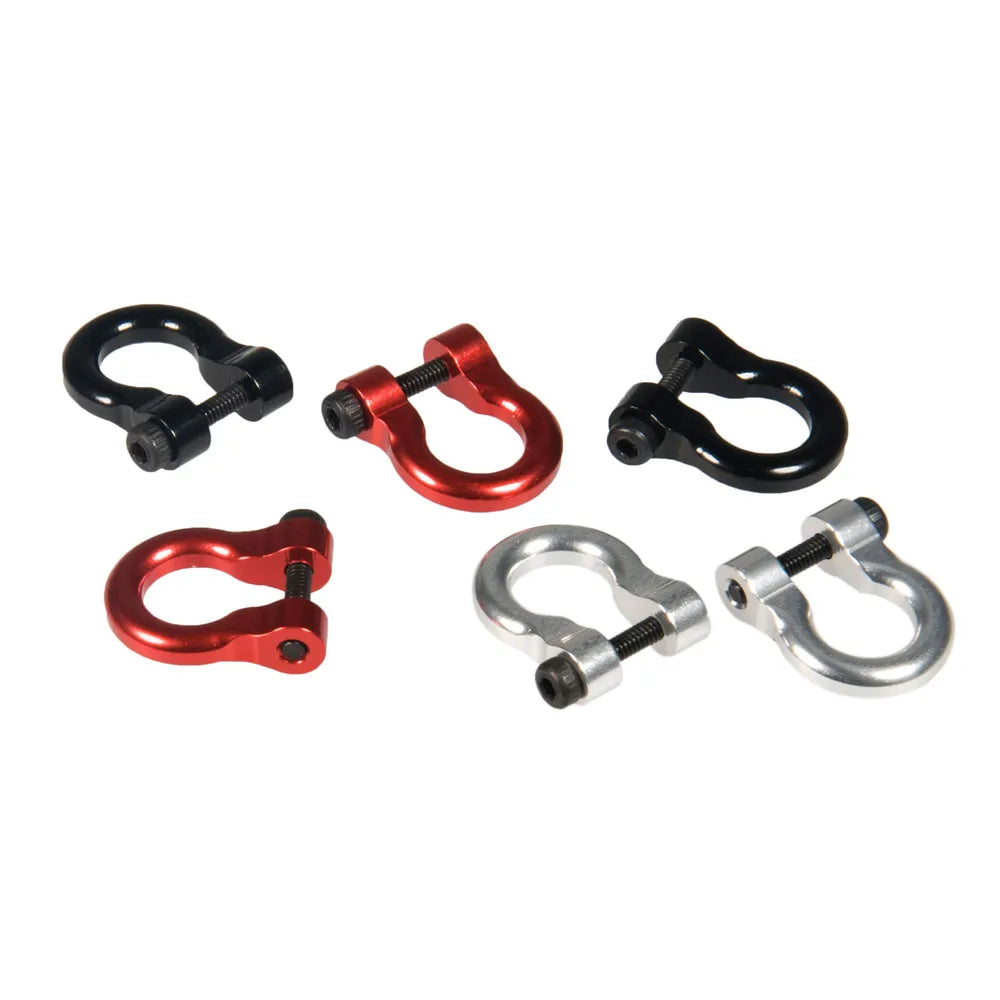 A set of two metal alloy tow shackles in red and black for an RC crawler.