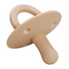 A beige silicone baby pacifier soother with a curved handle and a rounded body.
