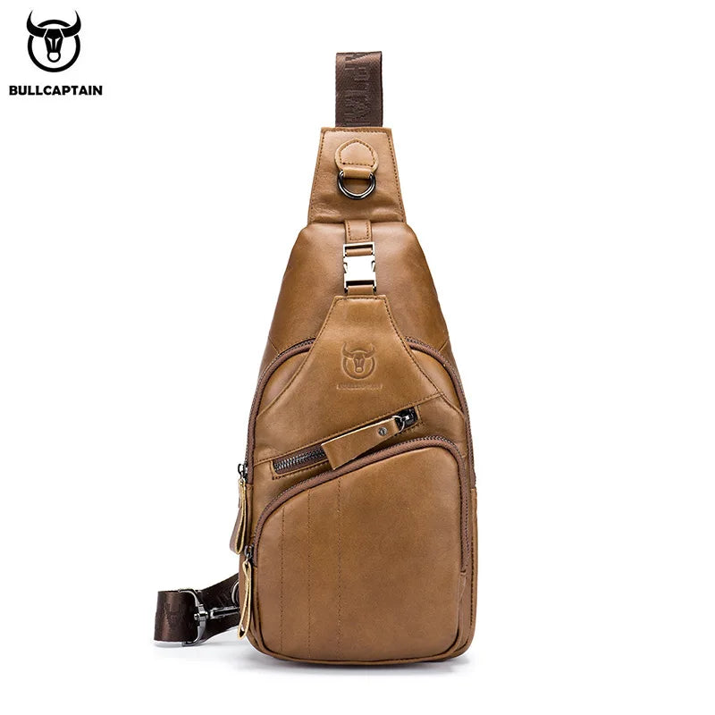 A brown men's genuine leather chest bag with a laptop compartment and leather strap.