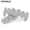 مجموعة أسنان ذهبية صلبة (Grillz)