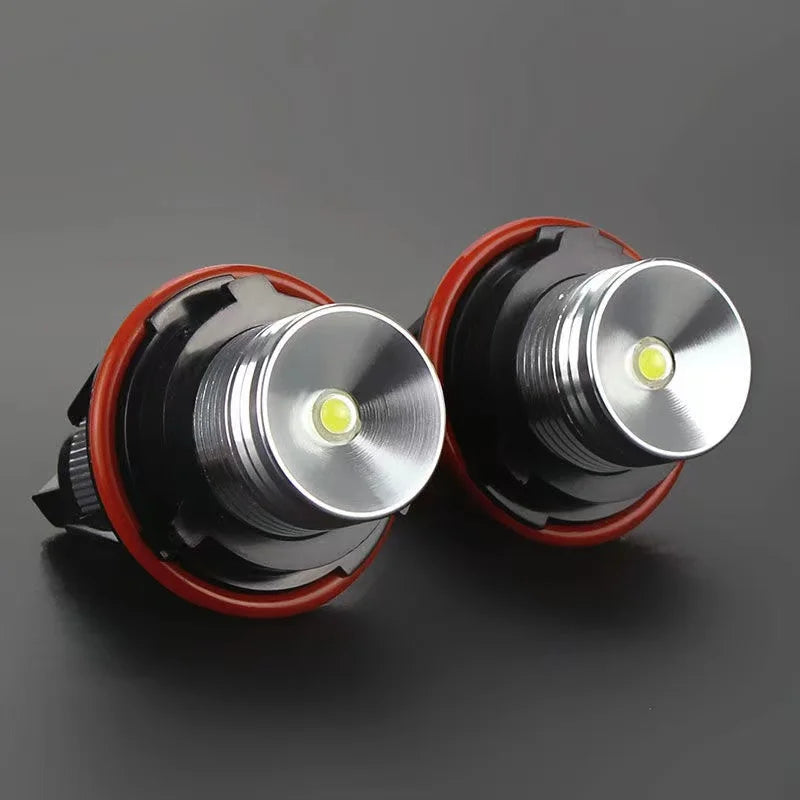 Pair of LED angel eyes marker light bulbs with silver and black housing and red accents