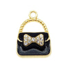 A set of six gold-toned pendant charms featuring a black enamel bag design with a sparkling bow detail.