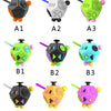 A set of nine 12-sided fidget cubes in various colors including black, silver, green, purple, and orange.