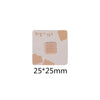 A square iron-on patch featuring a light pink, textured design resembling a piece of toast or bread.