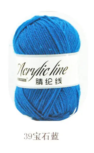 A ball of bright blue acrylic yarn labeled as Acrylic line with 39 grams.
