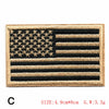 Embroidered American flag patch featuring stars and stripes in black and tan thread.