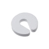 A white foam door stopper with a finger pinch protection design.