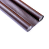 Two rolls of dark brown flexible door bottom sealing strip material.