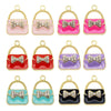 A set of six crystal enamel handbag charm pendants in various colors including pink, red, purple, and black.