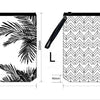 Black transparent travel toiletry bag with a palm leaf pattern and a hanging hook.