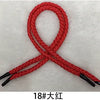 A red cord or string with black tips tied into a knot, labeled 18# 大红.