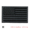 Black embroidered American flag patch with horizontal stripes and a star field.