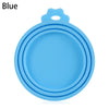 A light blue reusable silicone food storage lid with a handle, shown from above.