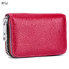 A vibrant red genuine leather card holder with a zipper and RFID protection feature.