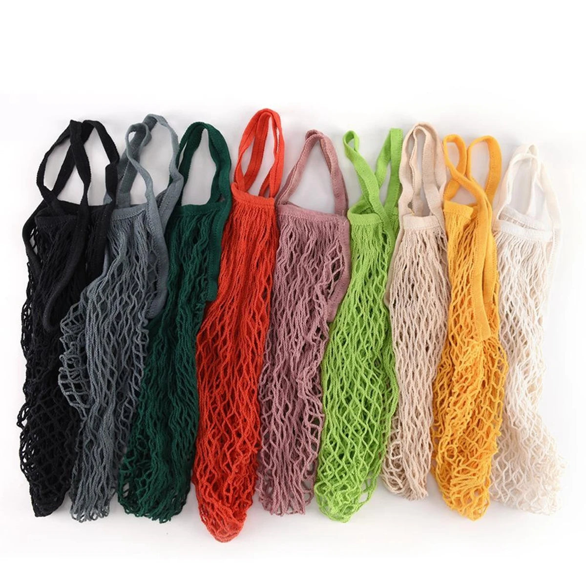 A collection of nine reusable organic cotton mesh produce bags in various shades of green, orange, and beige.