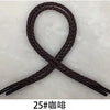 A dark brown braided string rope shaped into an 'X' or cross pattern.