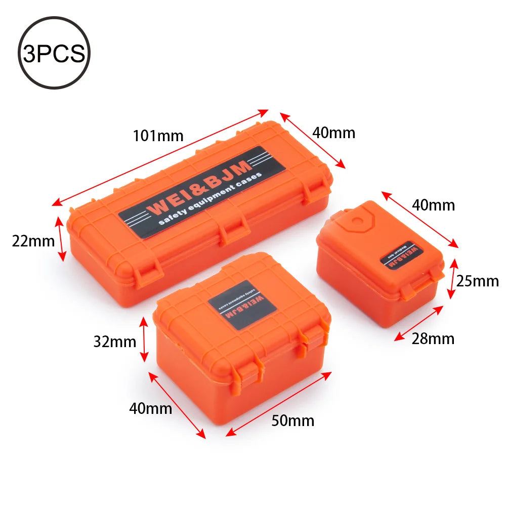 Three orange safety equipment cases for an RC crawler decoration set.