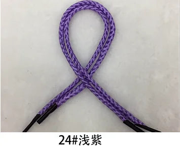A purple braided string rope with black ends, shown in an 'X' shape.