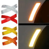 A set of four reflective safety strips in white, red, yellow, and orange, shaped like an 'X', displayed against a dark backgr