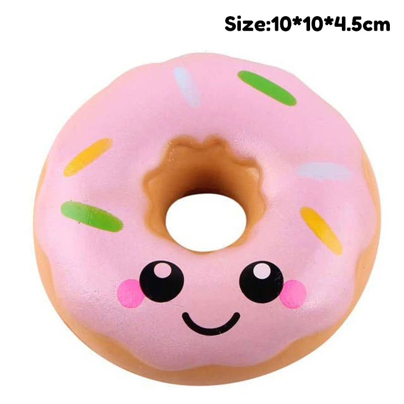 Pink donut squishy toy with yellow and green sprinkles, designed for stress relief.