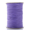 A spool of purple waxed cotton cord used for jewelry making.
