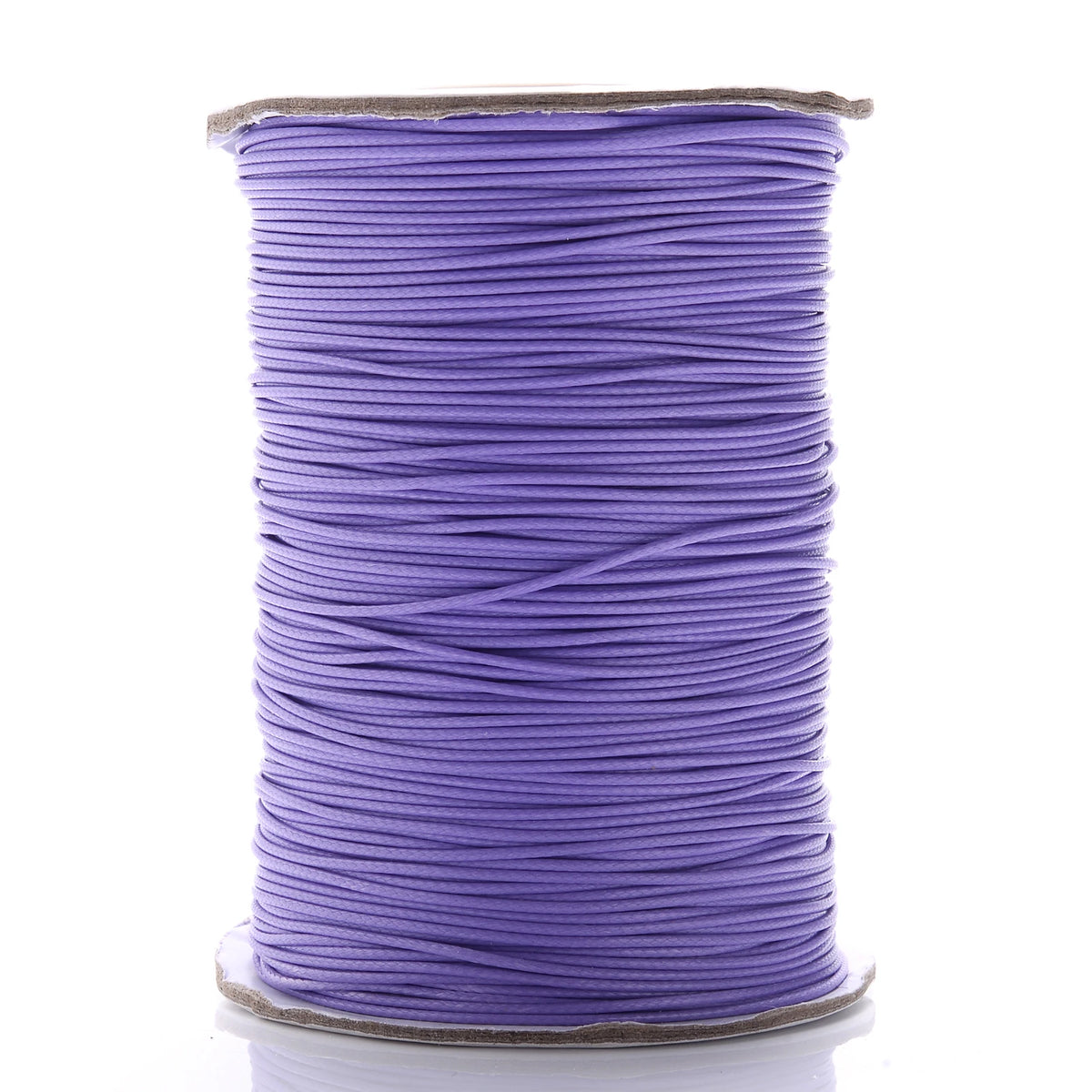 A spool of purple waxed cotton cord used for jewelry making.