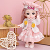 A pink fashion doll wearing a chef hat and white coat stands next to a golden cage and a wooden stand.