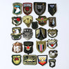 A collection of embroidered US Marine Corps medal patches featuring various military and service insignia.