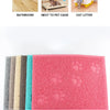A stack of multi-colored, textured cat litter mats with paw print designs shown alongside a bathroom, pet cage, and cat litte