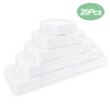 A stack of twenty white melamine cleaning sponges.