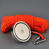 Orange heavy-duty salvage magnet with a 15m rope and gloves coiled on a gray background.