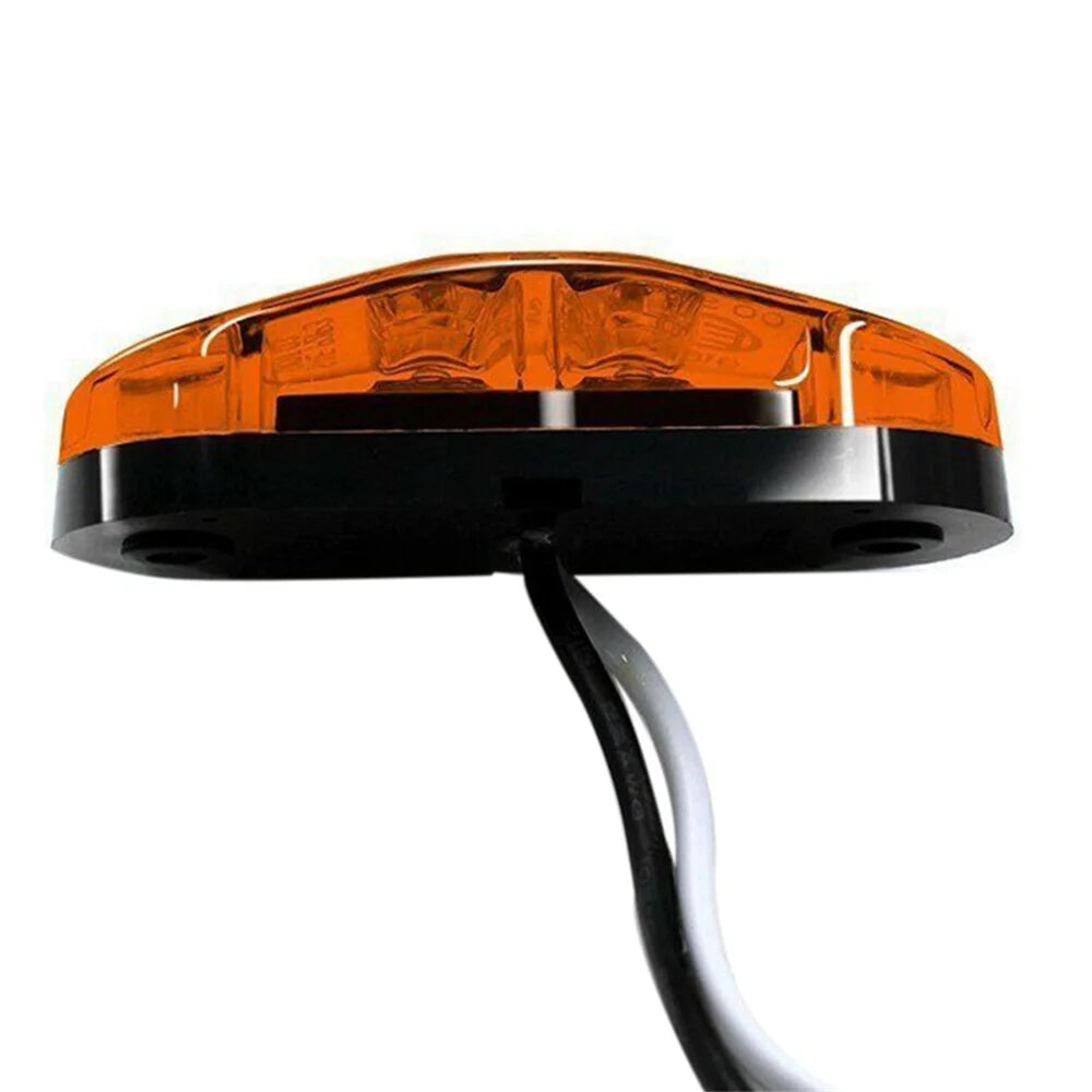 A close-up view of a black automotive LED side marker and clearance light assembly.