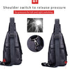Black leather backpack showing shoulder switch and adjustment buttons for pressure release