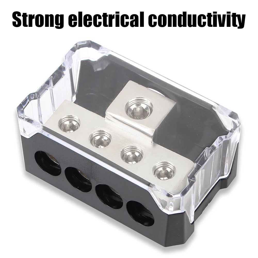 A clear and black electrical distribution block with four holes for power connections.
