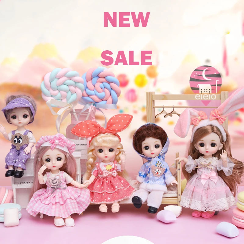 A collection of pink and purple fashion dolls with elaborate hair and clothing displayed on a light pink background.