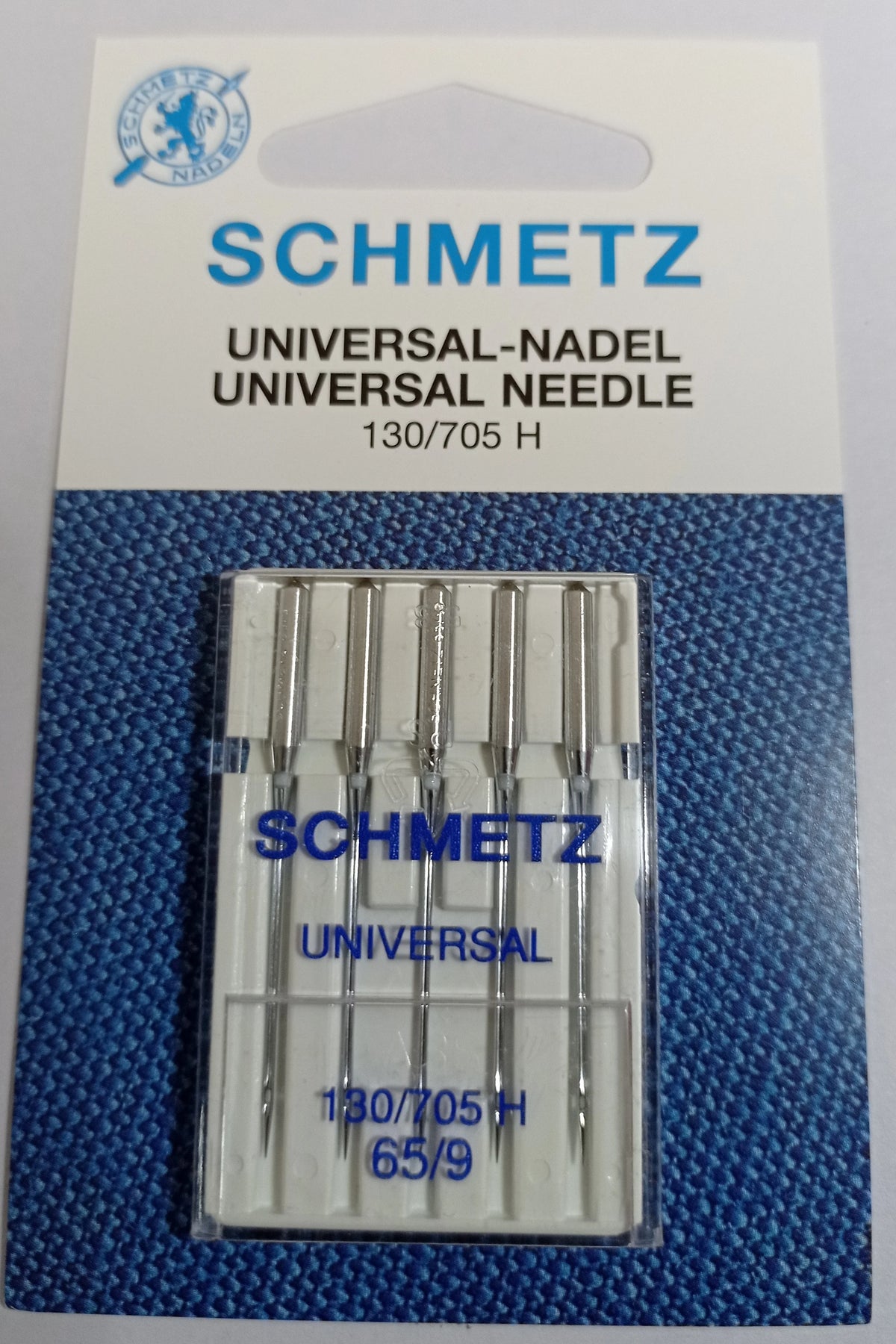 A package of five SCHMETZ universal sewing machine needles labeled 130/705 H 65/9.