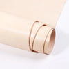 A roll of light beige vegetable-tanned full-grain leather used for crafting.