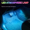 An automobile interior showing a blue LED atmosphere lamp illuminating the floor and dashboard area.