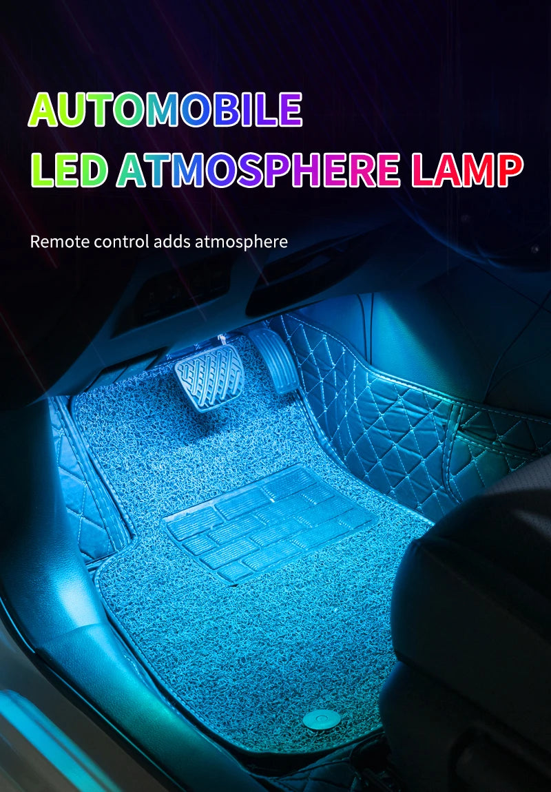 An automobile interior showing a blue LED atmosphere lamp illuminating the floor and dashboard area.