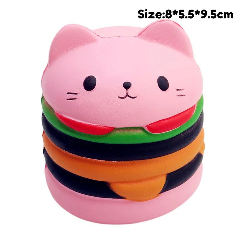 Pink cat squishy toy with a striped accessory design