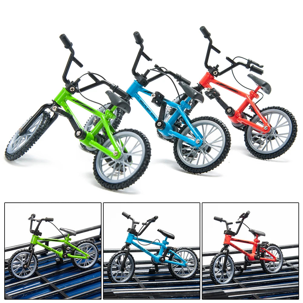 A set of three 1/10 scale RC crawler decorations in green, blue, and red, complete with accessories like a shovel, fire extin