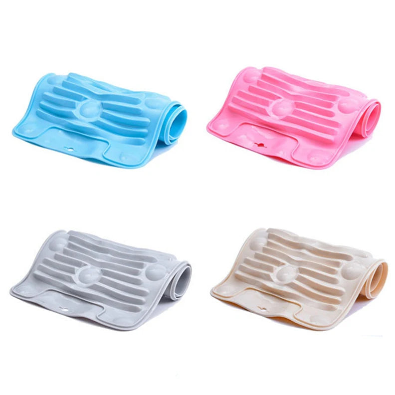 Three foldable silicone washboards in blue, pink, and beige with non-slip suction cups.